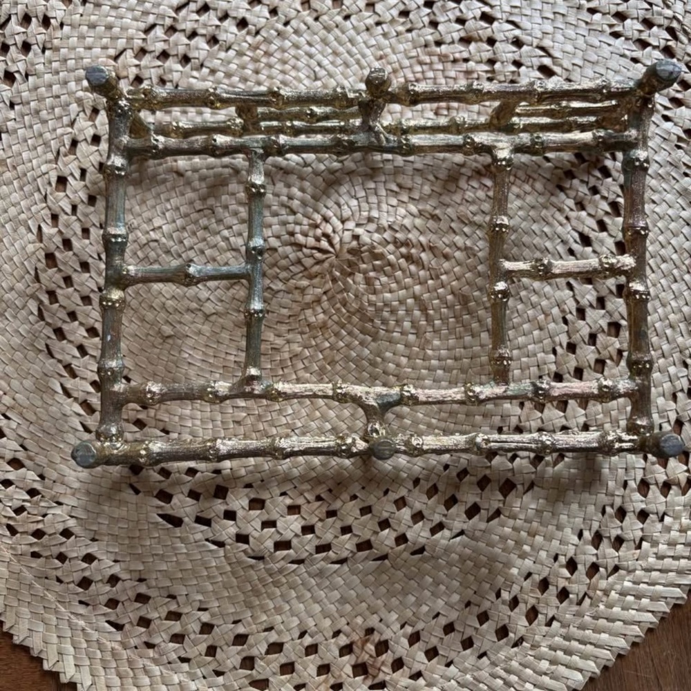 Vintage gold colored bamboo style napkin or mail holder..